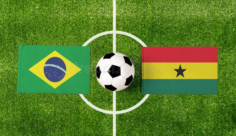 top view ball brazil vs ghana flags match green soccer field 214001541