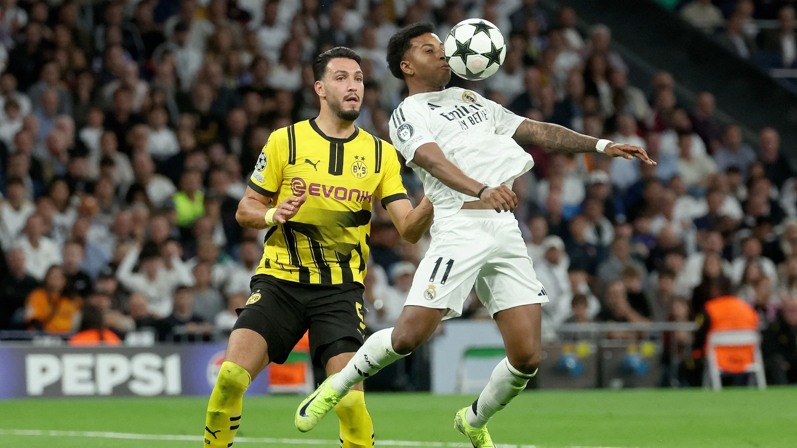 ما هي القنوات الناقلة لمباراة ريال مدريد ضد بوروسيا دورتموند في كأس العالم للأندية 2025؟ وكيف يمكنك متابعتها عبر الإنترنت؟ kooora logo